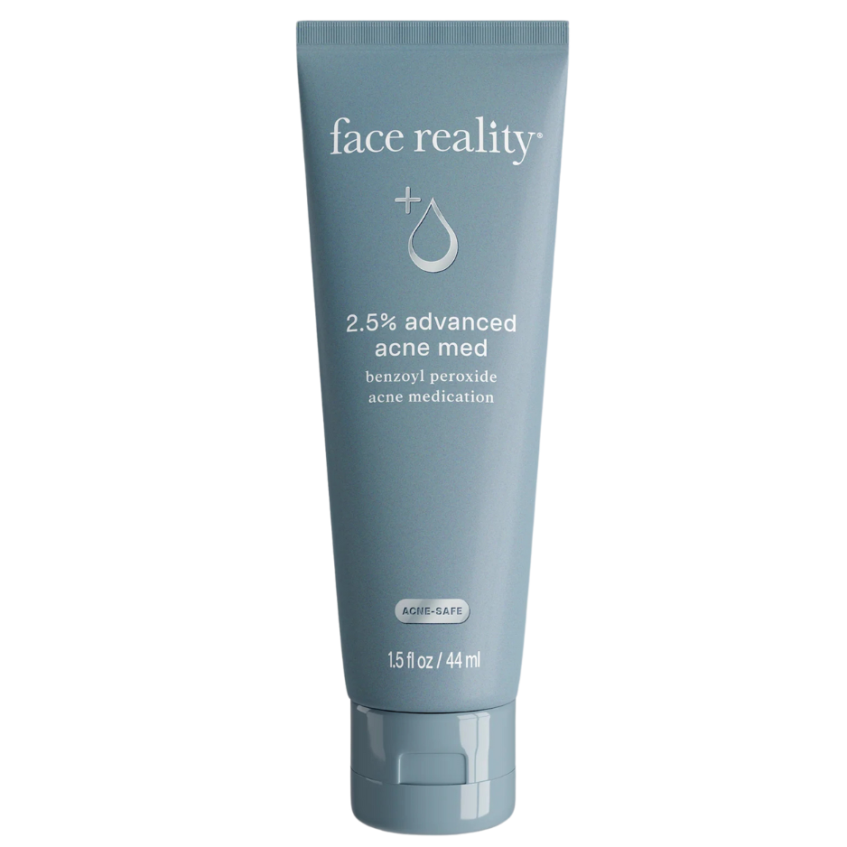 Tube of 'face reality' acne medication on a white background