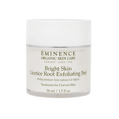 A jar of Eminence Bright Skin Licorice Root Exfoliating Peel with white and green labeling, indicating it is a skin care product for uneven skin.