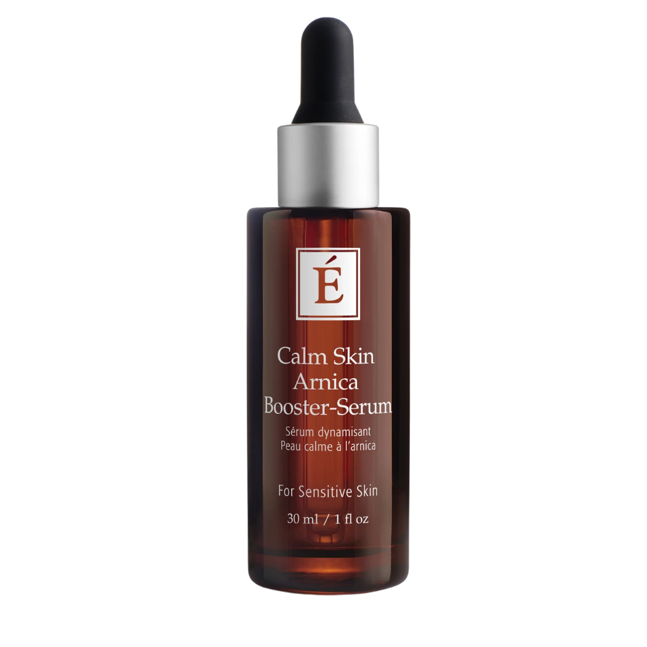 A bottle of Eminence Calm Skin Arnica Booster-Serum with a dropper, labeled for sensitive skin.