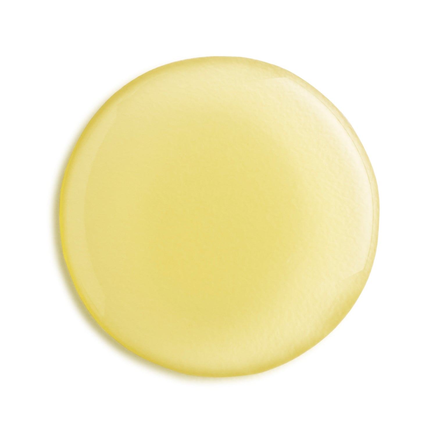 Round yellow oil on a white background