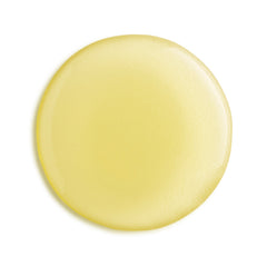 Round yellow oil on a white background