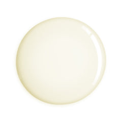 Round beige oil on a white background