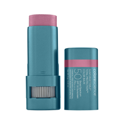 Two blue color balm sticks with pink caps on a white background