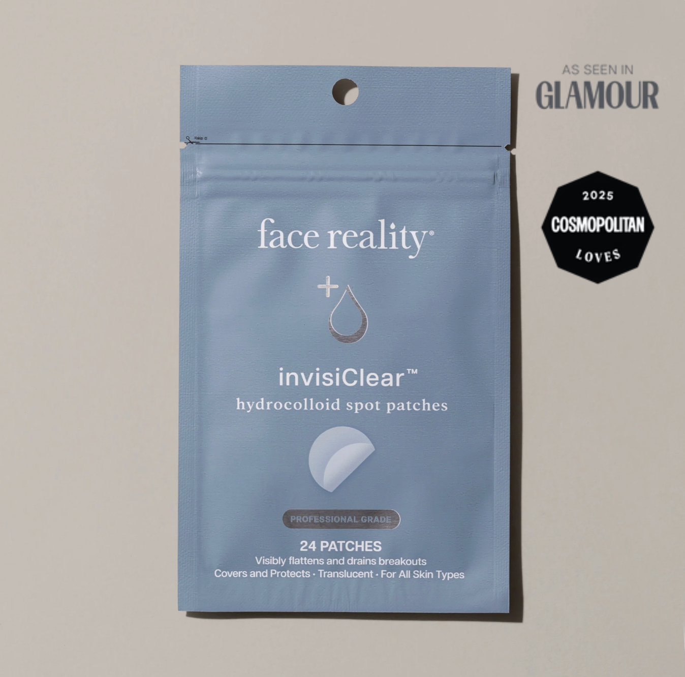 Blue package of face reality invisiClear hydrocolloid spot patches on a beige background