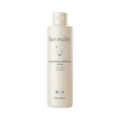 Bottle of 'face reality' soothing radiance toner on a white background