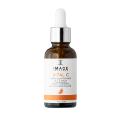 Skincare serum bottle with dropper labeled 'Image Skincare Vital C' on a white background