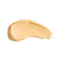 Gold-colored cream swatch on a white background