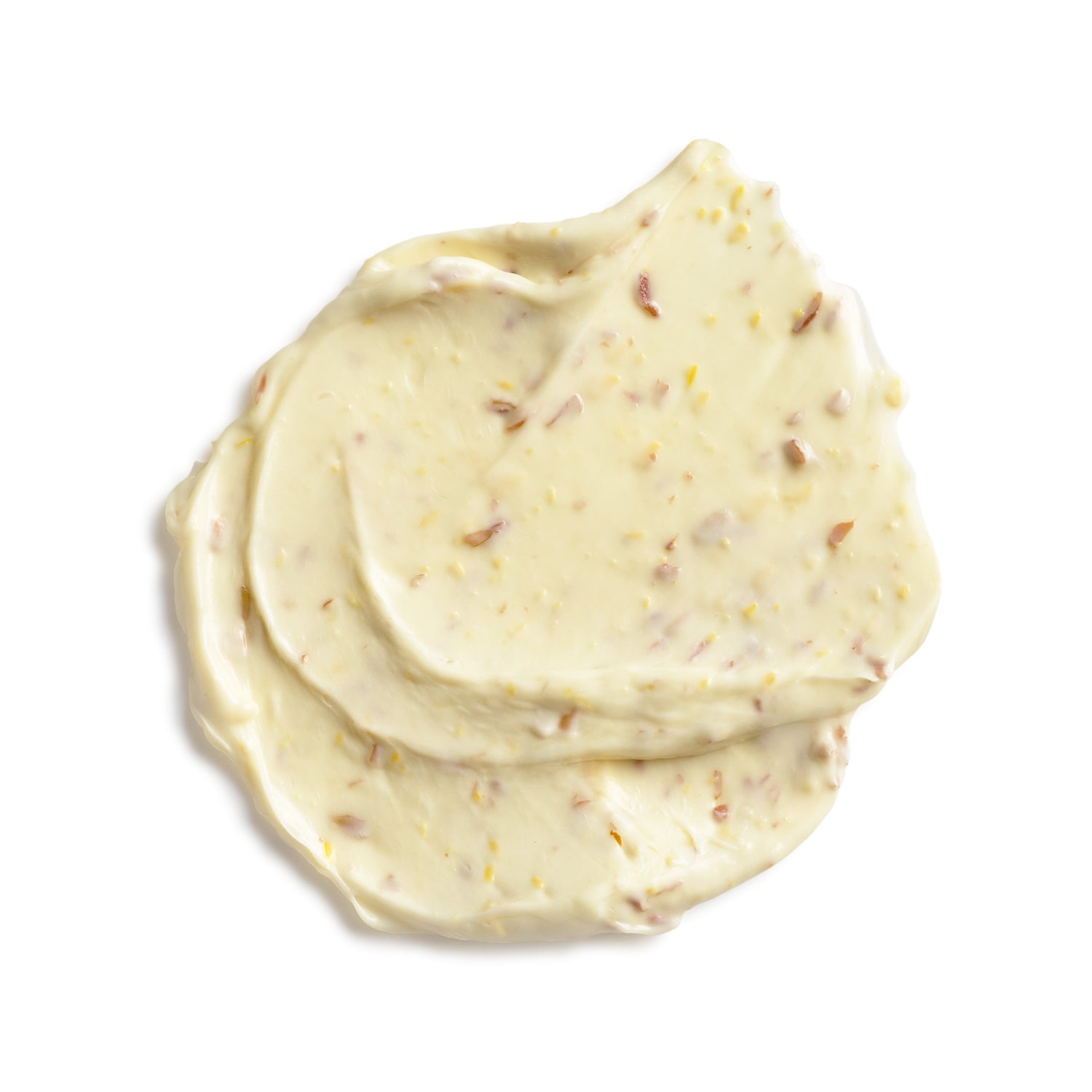 Close-up of a swirl of creamy white substance with specks on a white background