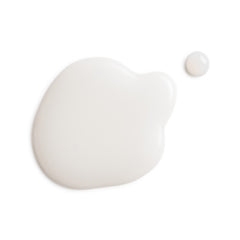 Two white blobs of cream on a white background