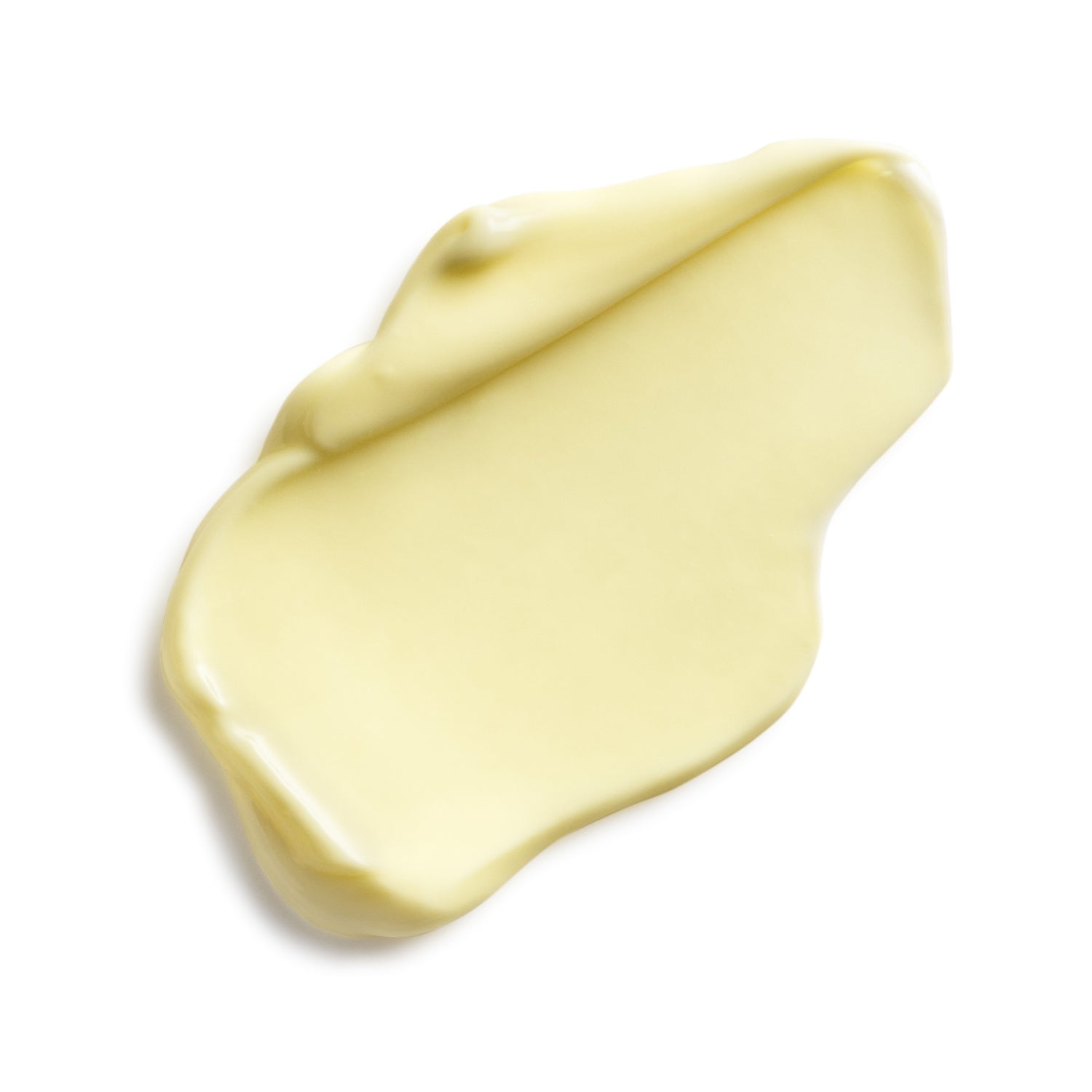 Creamy yellow cleanser on a white background