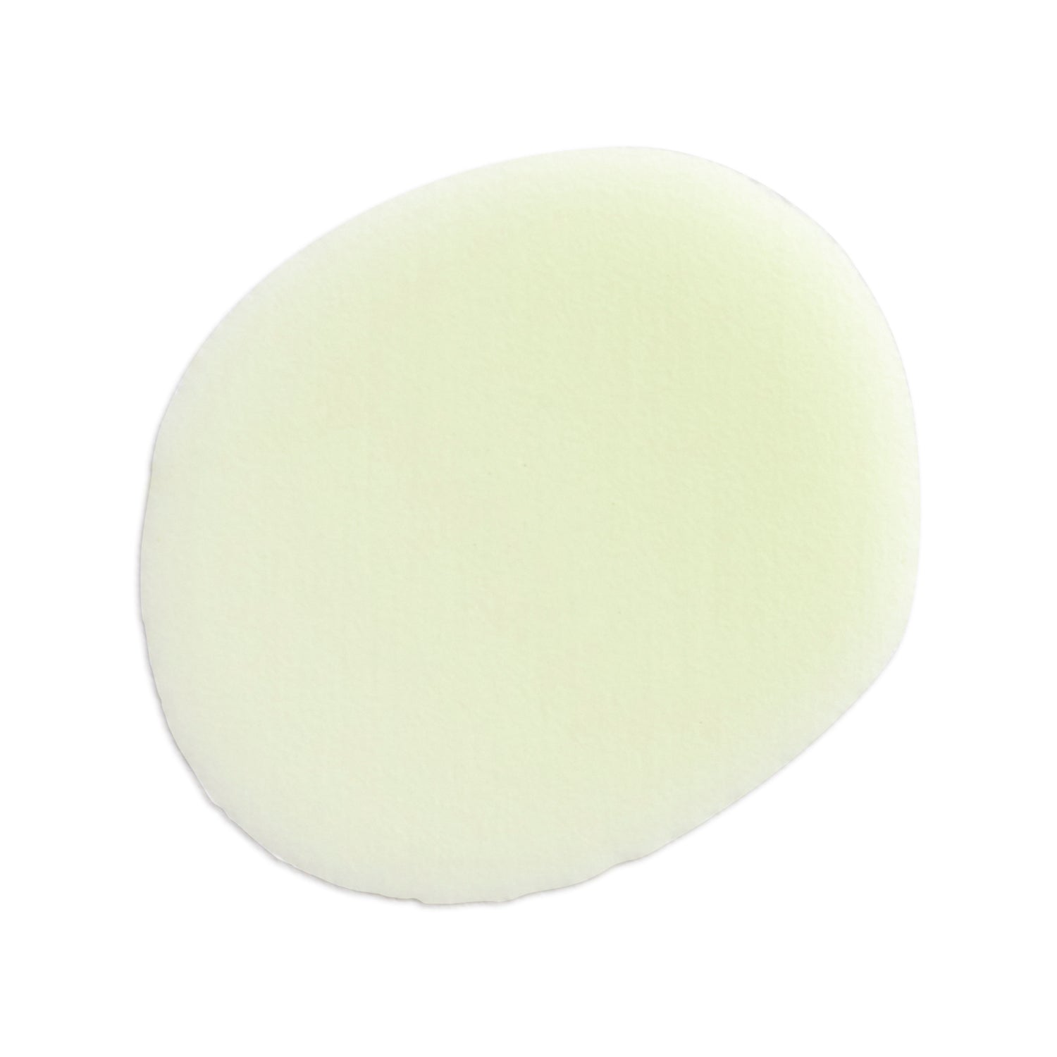 Round, light-colored serum on a white background