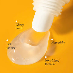 Bottle of skincare product with a droplet on an orange background, labeled 'Glossy finish', 'Gel texture', 'Non-sticky', and 'Nourishing formula'.